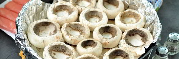 шампиньоны, фаршированные снежным крабом