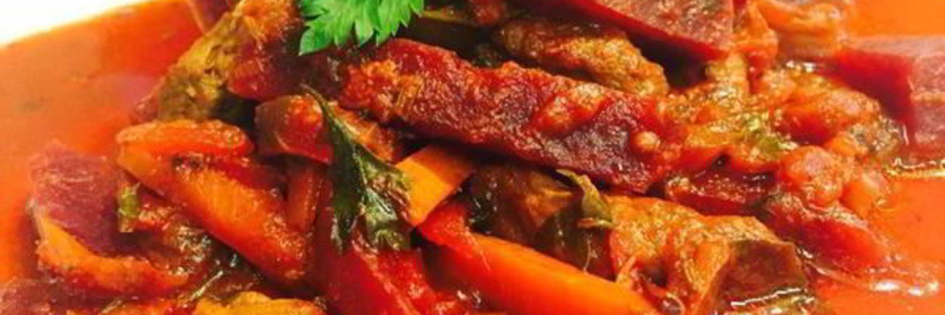 Говядина, тушеная с овощами