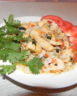 Курица, тушеная с рисом и овощами