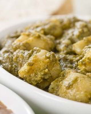 Тушеный картофель с зеленым соусом