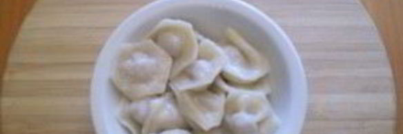 пельмени под соусом