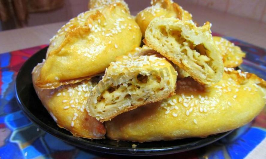 Рецепт пирожков с брынзой и зеленью закусочные в духовке