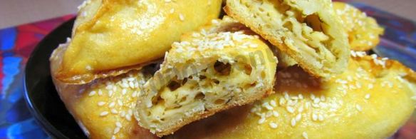 пирожки с брынзой и зеленью закусочные в духовке
